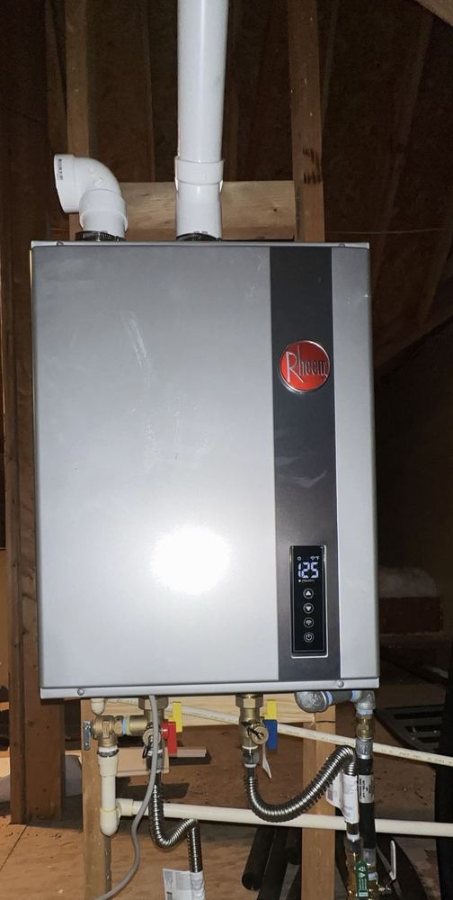 Rheem tankless water heater installed in Houston attic