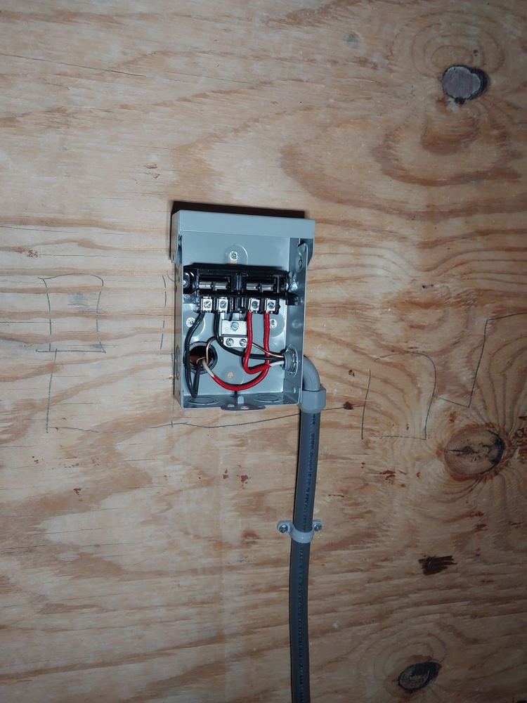 New AC disconnect wired with conduit